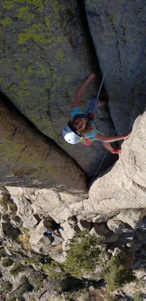 7 year old girl climbing leaning column